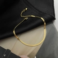 Elegante cavigliera a catena serpente dorata in acciaio al titanio con chiusura - Oro