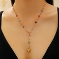Gold Y-shaped necklace with colorful zircon stones and heart pendant on a model - Gold Heart Y-shaped (2205)