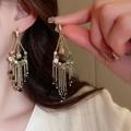 Close-up of bohemian gold tassel earrings with multicolored zircon on a model - 38# Hook-Gold-Black