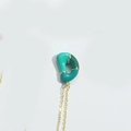 Golden necklace with a 3D curved green enamel balloon-style pendant on an O-chain - Letter D