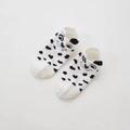 Close-up of white cotton socks with black spots and 3D ears featuring a Dalmatian dog - Dalmatian