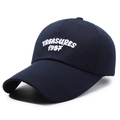 Navy blue baseball cap with white TREASURES 1987 embroidery and long brim detail - Adjustable / Navy Blue