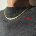 Detail shot of a 45cm gold stainless steel snake chain choker on model neck - Gold-45cm