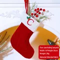 Red knit Christmas stocking with white cuff and embroidered letter C on fireplace - Letter C / Red