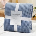 Soft blue flannel waffle texture blanket tied with white ribbon and gift card packaging - Smoky Blue