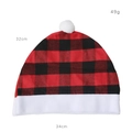 Detail of red and black buffalo plaid Christmas hat with dimensions 32x34cm and soft plush trim - Red and Black Grid