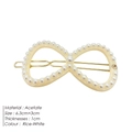 Elegant rice-white acetate infinity hair clip with pearl accents and gold metal fastener - Off White