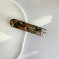 Detail of green and brown tortoiseshell acetate hair clip with floral rhinestones - Green Coffee