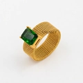 Detailed view of emerald-cut green gemstone on a golden mesh titanium steel ring - US 7 / Green