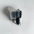 Black dual-sided silicone facial cleansing brush with clear cover and gray lanyard - Black Soft Finish - With Lid + OPP Bag