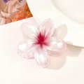 Macro view of gradient pink flower hair claw with a pearlescent finish and smooth edges - Pearlescent Burgundy