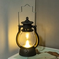 Retro black LED lantern with warm yellow light and portable handle for Christmas decor - Black Lantern (Wick Type)