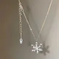 Elegant snowflake pendant necklace in silver finish with shimmering cubic zirconia crystals - X843 Silver - Snowflake Shape