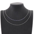 Double-layered silver necklace featuring minimalist thin chains and bright blue beads - Silver Royal Blue Beads (KN201897-Z)