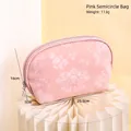 Borsa cosmetica a semicerchio in pelle PU rosa con trama floreale a rilievo e cerniera - Borsa a Semicerchio Rosa