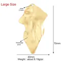 Detailed view of large irregular lava texture gold pendant with size measurements - Irregular Wave Design / Gold