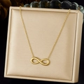 Elegant gold-plated stainless steel infinity symbol necklace on a beige jewelry display - Gold Infinity Style (N3936)