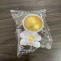 White astronaut night light with golden star detail in clear plastic packaging - Small Astronaut Gold Star