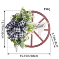Wooden wheel wreath with welcome sheep sign, green plants and black-white bow - S3-11 Cow Wagon Wheel Wreath
