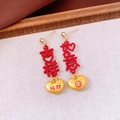Detail of Chinese style tassel earrings with red Ji-Xiang characters and gold lock charms - Silver Pin - Gold - Ingot