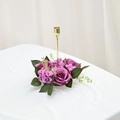 Detailed view of elegant golden metal candle holder with purple rose and leaf wreath decor - Purple