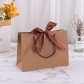 Brown kraft paper gift bag with a wide satin bow and sturdy woven rope handles - 28*20*10cm / Kraft Color + Brown Ribbon