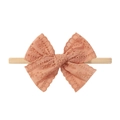 Orange lace bow baby headband with floral hollow pattern and elastic beige band - Orange
