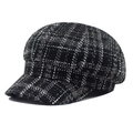 Close-up of the black and white plaid tweed newsboy cap showing detailed fabric texture - One Size / Black