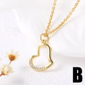 Elegant gold-plated asymmetrical heart pendant necklace with shimmering white zircons - Heart
