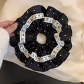 Detailed view of a black polka dot scrunchie with delicate white lace trim - Black Polka Dot White Lace (2#)