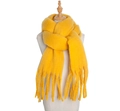 Soft mohair winter scarf in bright yellow with fringe detail on wooden mannequin - Ginger Yellow