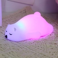 Polar bear silicone night light with soft purple and blue LED glow on lace mat - Lying Bear (Battery-7 Colors)