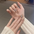 Short nude gradient press-on nails in almond shape with luxury square rhinestone accents - By1731 Radiant Colors / Phototherapy Glue Style