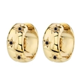 Close-up of golden hoop earrings featuring engraved star patterns and black zircons - Gold - Black Zirconia