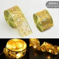 Golden 5CM LED double-layer ribbon with star prints for Christmas decor, 2M length - Battery Box Flashing String / 2 Meters / Gold