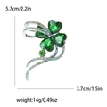 Broche trèfle élégante avec cristaux verts et strass, dimensions de 5,7x3,7 cm - Vert