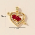 Detailed view of heart arrow pendant with red zircons and dimensions of 2.2cm - 0228-25/Gold Red Cupid Heart