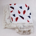 Detail of baby blanket showing red and blue leaf prints with elegant tassel lace trim - Custom Size / Red Feather