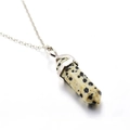 Macro shot of hexagonal Dalmatian Jasper pendant with silver-tone metal bail and chain - Pendant Only / Spotted Stone