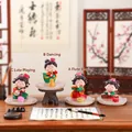 Traditional Chinese Tang lady figurines in four styles on a classic wooden desk - Stand Set of 4 / Ancient Style Ornament Series
