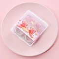 Detail of pink floral washi tape set in a plastic storage box on a decorative plate - Girl-Red Set