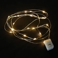 Luminous LED fairy light string with warm white glow and battery box on dark background - 2 Meters Warm White LED String Lights (With Pin)