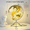 Black and gold 20cm transparent LED globe ornament with silver tripod base - LED Globe - Gold