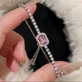 Detailed close-up of a zircon floral hollow bracelet with a pink rectangular gemstone - 34# Silver Pink Rectangular Style
