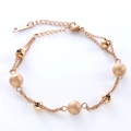Pulsera de doble cadena de acero inoxidable con cuentas mates y pulidas en color oro rosa - Oro rosa