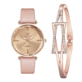 Close-up of rose gold quartz watch with pink strap and sparkling rhinestone cuff bracelet - Rose Gold Watch and Bracelet Set