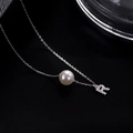 Elegant S925 silver necklace with white pearl and sparkling pavé letter R pendant - Letter R