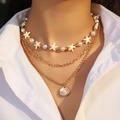 Golden multi-layer necklace with white starfish charms and pearl pendant decoration - Gold Starfish Shell