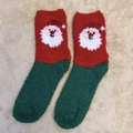Christmas coral fleece socks with Santa Claus pattern in festive red and green colors - One Size / New Santa Head