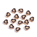 Detailed macro view of heart-shaped blue evil eye beads for DIY jewelry making - Heart / Black